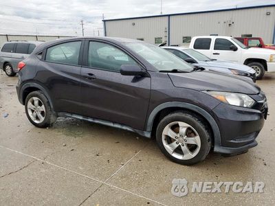 Czwarte zdjęcie samochodu z boku: 2016 HONDA HR-V LX VIN:3CZRU6H34GM748958 - miniatura