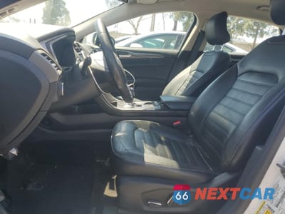 Zdjęcie 7 z 13 samochodu: 2017 FORD FUSION SE HYBRID VIN:3FA6P0LU5HR409312 - miniatura