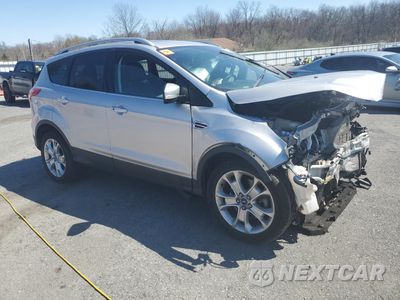 Czwarte zdjęcie samochodu z boku: 2016 FORD ESCAPE TITANIUM VIN:1FMCU9J9XGUB87572 - miniatura