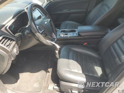 Zdjęcie 7 z 12 samochodu: 2017 FORD FUSION SE HYBRID VIN:3FA6P0LU5HR409195 - miniatura