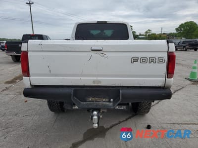 Zdjęcie 6 z 12 samochodu: 1996 FORD F350 VIN:1FTJW36F2TEB16744 - miniatura