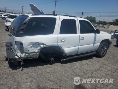 Trzecie zdjęcie samochodu z tyłu: 2004 CHEVROLET TAHOE C1500 VIN:1GNEC13V64R303447 - miniatura