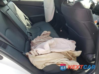 Zdjęcie 10 z 12 samochodu: 2022 TOYOTA PRIUS PRIME LE VIN:JTDKAMFP5N3206955 - miniatura