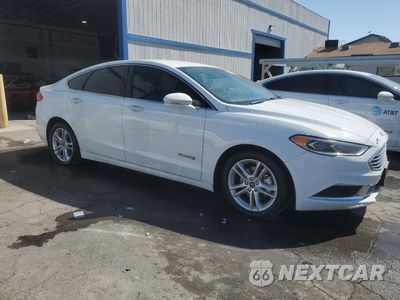 Czwarte zdjęcie samochodu z boku: 2018 FORD FUSION SE HYBRID VIN:3FA6P0LU8JR118664 - miniatura