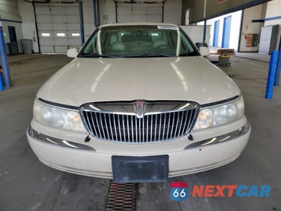 Piąte zdjęcie samochodu w środku: 1999 LINCOLN CONTINENTAL VIN:1LNHM97V9XY667718 - miniatura