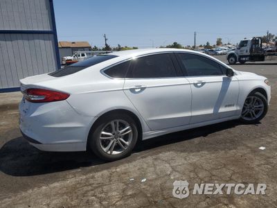 Trzecie zdjęcie samochodu z tyłu: 2018 FORD FUSION SE HYBRID VIN:3FA6P0LU7JR118669 - miniatura
