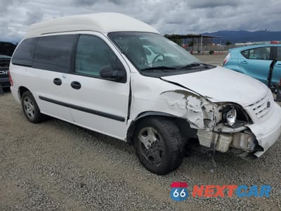 Czwarte zdjęcie samochodu z boku: 2007 FORD FREESTAR SE VIN:2FMZA51697BA17615 - miniatura