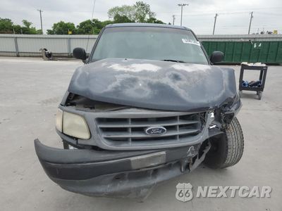 Piąte zdjęcie samochodu w środku: 2000 FORD F150 VIN:1FTRX17W9YNB80855 - miniatura