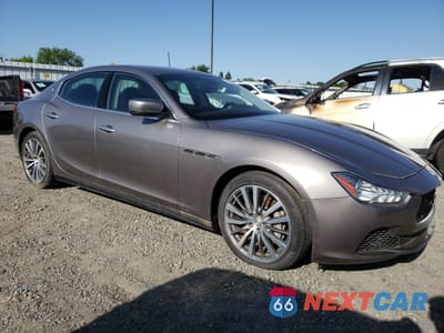 Czwarte zdjęcie samochodu z boku: 2016 MASERATI GHIBLI VIN:ZAM57XSA3G1171986 - miniatura
