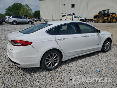 Trzecie zdjęcie samochodu z tyłu: 2017 FORD FUSION SE HYBRID VIN:3FA6P0LU2HR400731 - miniatura