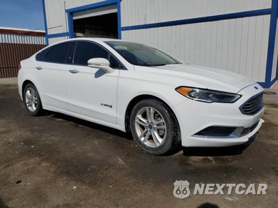 Czwarte zdjęcie samochodu z boku: 2018 FORD FUSION SE HYBRID VIN:3FA6P0LU0JR281874 - miniatura