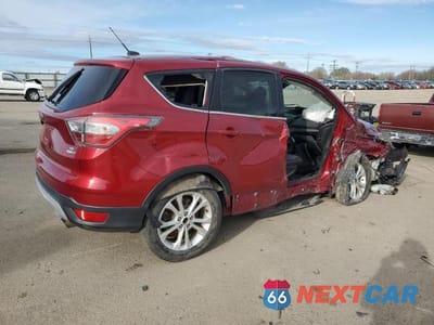 Trzecie zdjęcie samochodu z tyłu: 2017 FORD ESCAPE SE VIN:1FMCU9GD5HUA14510 - miniatura