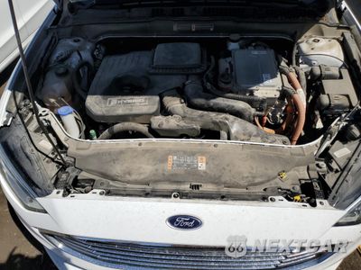 Zdjęcie 11 z 13 samochodu: 2017 FORD FUSION SE HYBRID VIN:3FA6P0LU0HR409363 - miniatura