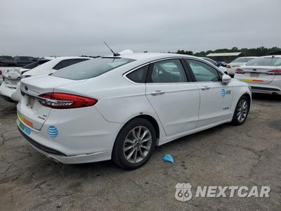 Trzecie zdjęcie samochodu z tyłu: 2017 FORD FUSION SE HYBRID VIN:3FA6P0LU0HR409640 - miniatura