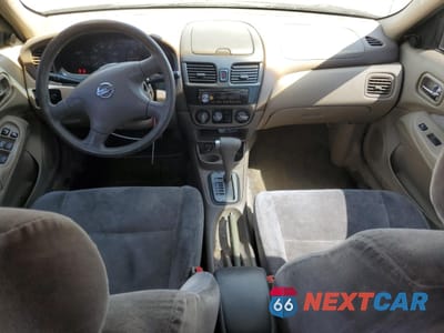 Zdjęcie 8 z 14 samochodu: 2003 NISSAN SENTRA XE VIN:3N1CB51D93L695952 - miniatura