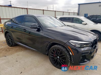 Czwarte zdjęcie samochodu z boku: 2022 BMW X6 XDRIVE40I VIN:5UXCY6C05N9K57192 - miniatura
