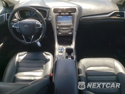Zdjęcie 8 z 12 samochodu: 2018 FORD FUSION SE HYBRID VIN:3FA6P0LU7JR171534 - miniatura