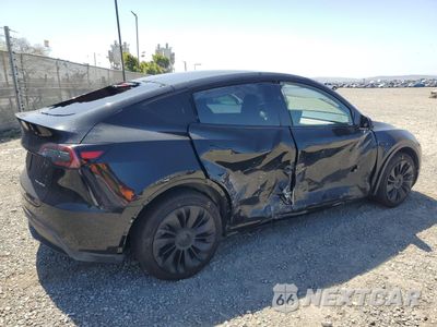 Trzecie zdjęcie samochodu z tyłu: 2023 TESLA MODEL Y VIN:7SAYGDEE5PA189136 - miniatura