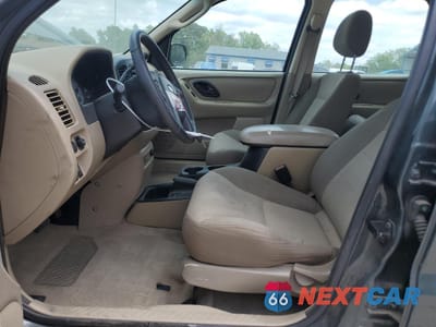 Zdjęcie 7 z 14 samochodu: 2003 FORD ESCAPE XLS VIN:1FMYU02183KB45840 - miniatura