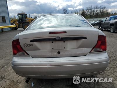 Zdjęcie 6 z 15 samochodu: 2004 FORD FOCUS LX VIN:1FAFP33PX4W132594 - miniatura