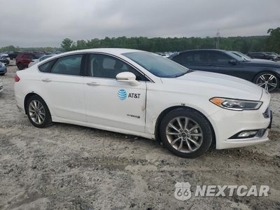 Czwarte zdjęcie samochodu z boku: 2017 FORD FUSION SE HYBRID VIN:3FA6P0LU7HR409618 - miniatura