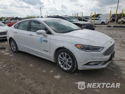 Czwarte zdjęcie samochodu z boku: 2017 FORD FUSION SE HYBRID VIN:3FA6P0LU9HR409409 - miniatura