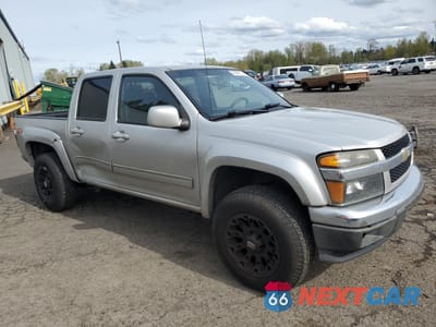 Czwarte zdjęcie samochodu z boku: 2012 CHEVROLET COLORADO LT VIN:1GCHTDFE4C8131829 - miniatura