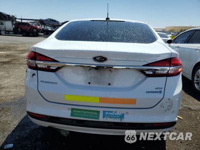 Zdjęcie 6 z 13 samochodu: 2018 FORD FUSION SE HYBRID VIN:3FA6P0LU8JR171591 - miniatura