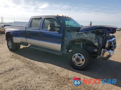 Czwarte zdjęcie samochodu z boku: 1999 FORD F350 SUPER DUTY VIN:1FTWW33F0XEA33619 - miniatura