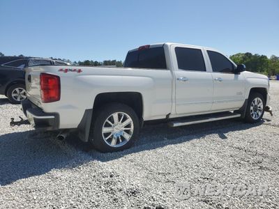 Trzecie zdjęcie samochodu z tyłu: 2017 CHEVROLET SILVERADO K1500 HIGH COUNTRY VIN:3GCUKTEJ9HG140134 - miniatura