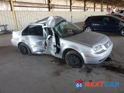 Czwarte zdjęcie samochodu z boku: 2001 VOLKSWAGEN JETTA GL TDI VIN:3VWRP29M81M011151 - miniatura