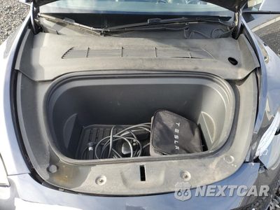 Zdjęcie 14 z 15 samochodu: 2022 TESLA MODEL Y VIN:7SAYGDEE7NF315691 - miniatura