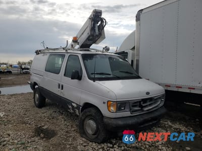 Czwarte zdjęcie samochodu z boku: 2001 FORD ECONOLINE E350 SUPER DUTY VAN VIN:1FTSE34L91HA90400 - miniatura