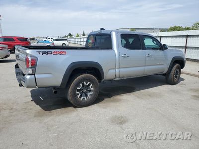 Trzecie zdjęcie samochodu z tyłu: 2023 TOYOTA TACOMA DOUBLE CAB VIN:3TMDZ5BN4PM169149 - miniatura