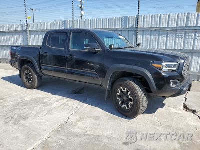 Czwarte zdjęcie samochodu z boku: 2023 TOYOTA TACOMA DOUBLE CAB VIN:3TMCZ5AN3PM577476 - miniatura