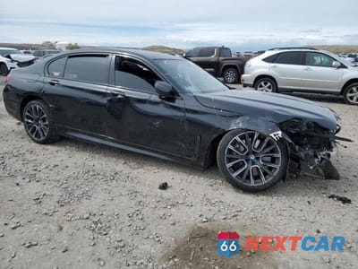 Czwarte zdjęcie samochodu z boku: 2021 BMW 750 XI VIN:WBA7U2C08MCF47564 - miniatura