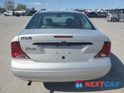 Zdjęcie 6 z 14 samochodu: 2003 FORD FOCUS LX VIN:1FAFP33P23W311601 - miniatura