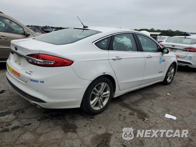 Trzecie zdjęcie samochodu z tyłu: 2018 FORD FUSION SE HYBRID VIN:3FA6P0LU9JR171907 - miniatura