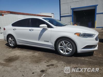 Czwarte zdjęcie samochodu z boku: 2018 FORD FUSION SE HYBRID VIN:3FA6P0LU1JR278627 - miniatura