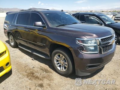 Czwarte zdjęcie samochodu z boku: 2015 CHEVROLET SUBURBAN K1500 LT VIN:1GNSKJKC7FR192724 - miniatura