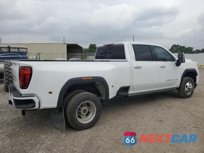 Czwarte zdjęcie samochodu z boku: 2022 GMC SIERRA K3500 DENALI VIN:1GT49WEYXNF312498 - miniatura