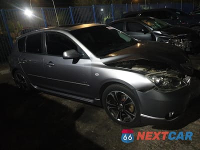 Czwarte zdjęcie samochodu z boku: 2005 MAZDA 3 HATCHBACK VIN:JM1BK143951276677 - miniatura