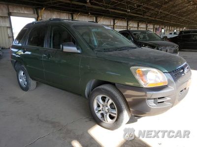 Czwarte zdjęcie samochodu z boku: 2007 KIA SPORTAGE EX VIN:KNDJF723677403890 - miniatura