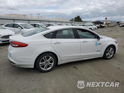 Trzecie zdjęcie samochodu z tyłu: 2018 FORD FUSION SE HYBRID VIN:3FA6P0LUXJR118875 - miniatura