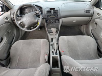 Zdjęcie 8 z 12 samochodu: 2002 TOYOTA COROLLA CE VIN:1NXBR12E12Z653554 - miniatura