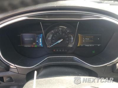 Zdjęcie 9 z 13 samochodu: 2017 FORD FUSION SE HYBRID VIN:3FA6P0LU3HR409311 - miniatura