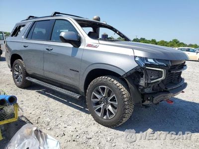 Czwarte zdjęcie samochodu z boku: 2021 CHEVROLET TAHOE K1500 Z71 VIN:1GNSKPKD0MR429465 - miniatura