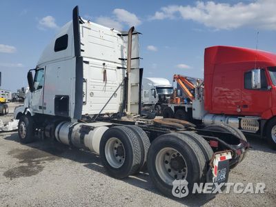 Trzecie zdjęcie samochodu z tyłu: 2014 VOLVO VNL SEMI TRUCK VIN:4V4NC9EH2EN167569 - miniatura