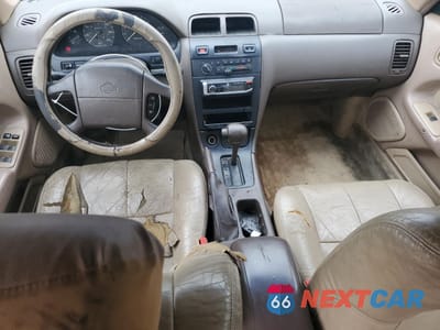 Zdjęcie 8 z 14 samochodu: 1996 NISSAN MAXIMA GLE VIN:JN1CA21D9TT185646 - miniatura