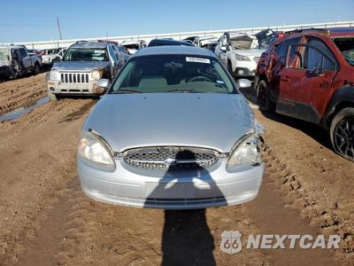 Piąte zdjęcie samochodu w środku: 2000 FORD TAURUS SE VIN:1FAFP5327YG202472 - miniatura